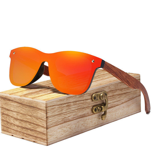 Shield Plus Wayfarer. Nice wide temple pieces on these. Wooden storage case included.