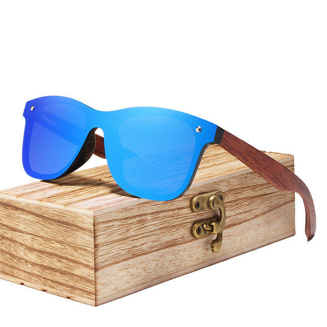 Shield Plus Wayfarer. Nice wide temple pieces on these. Wooden storage case included.