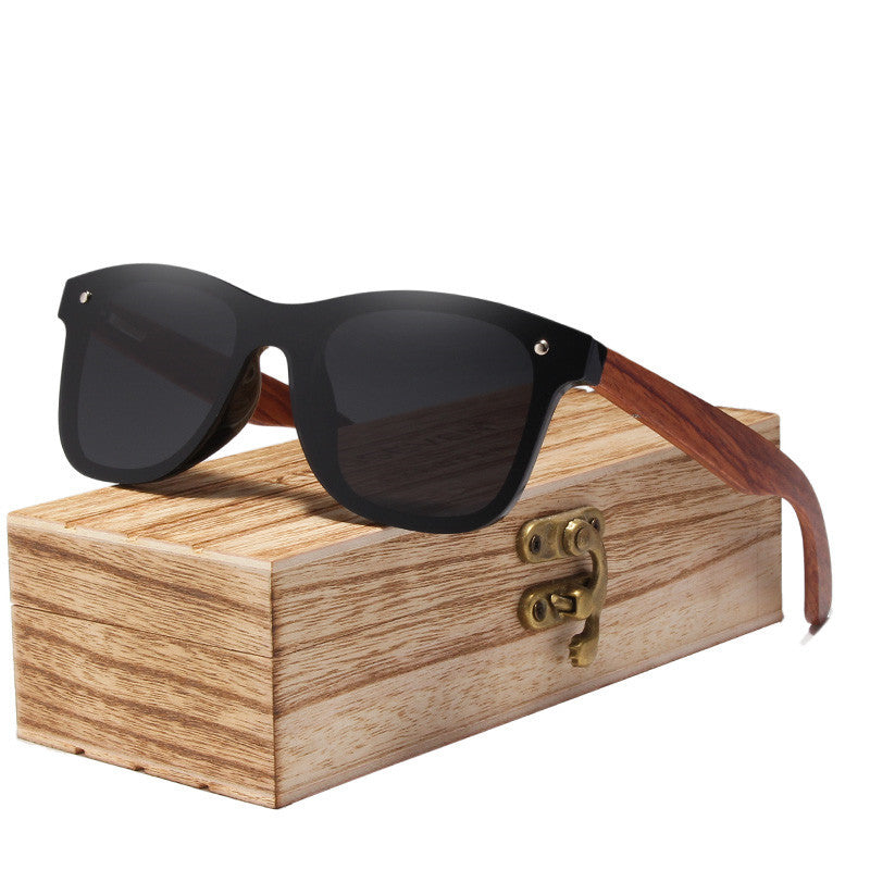 Shield Plus Wayfarer. Nice wide temple pieces on these. Wooden storage case included.