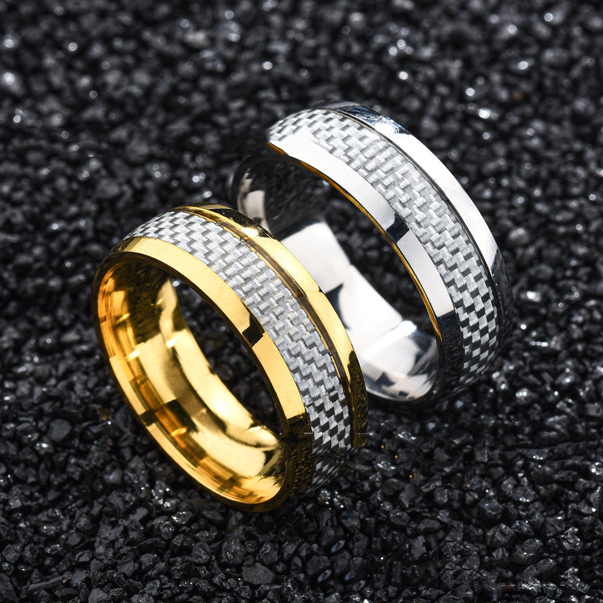 Titanium ring with drop in carbon fiber inlay
