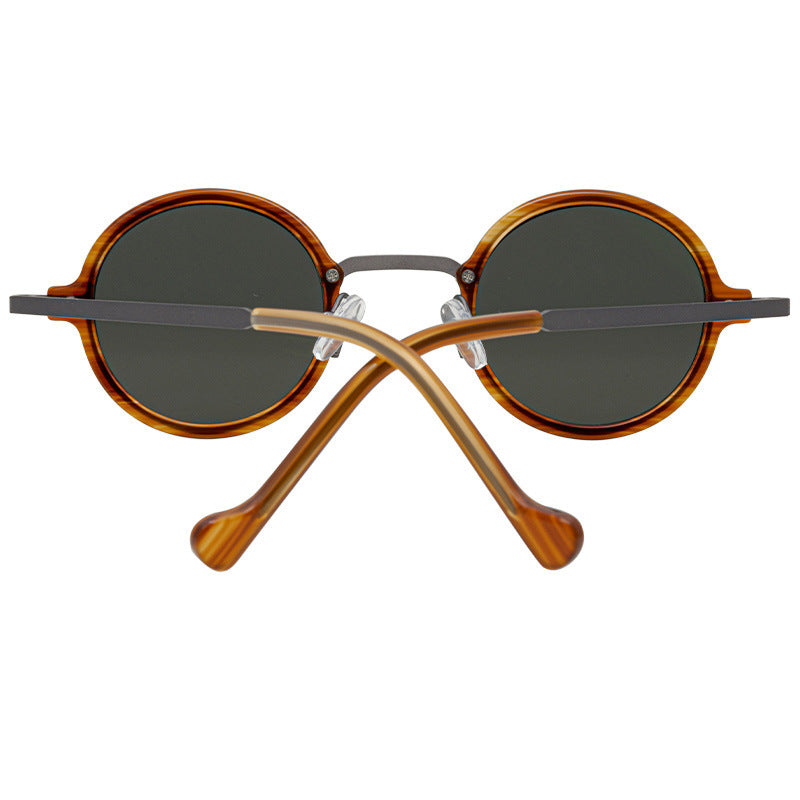 Round Sunglasses with accents around lenses and temples